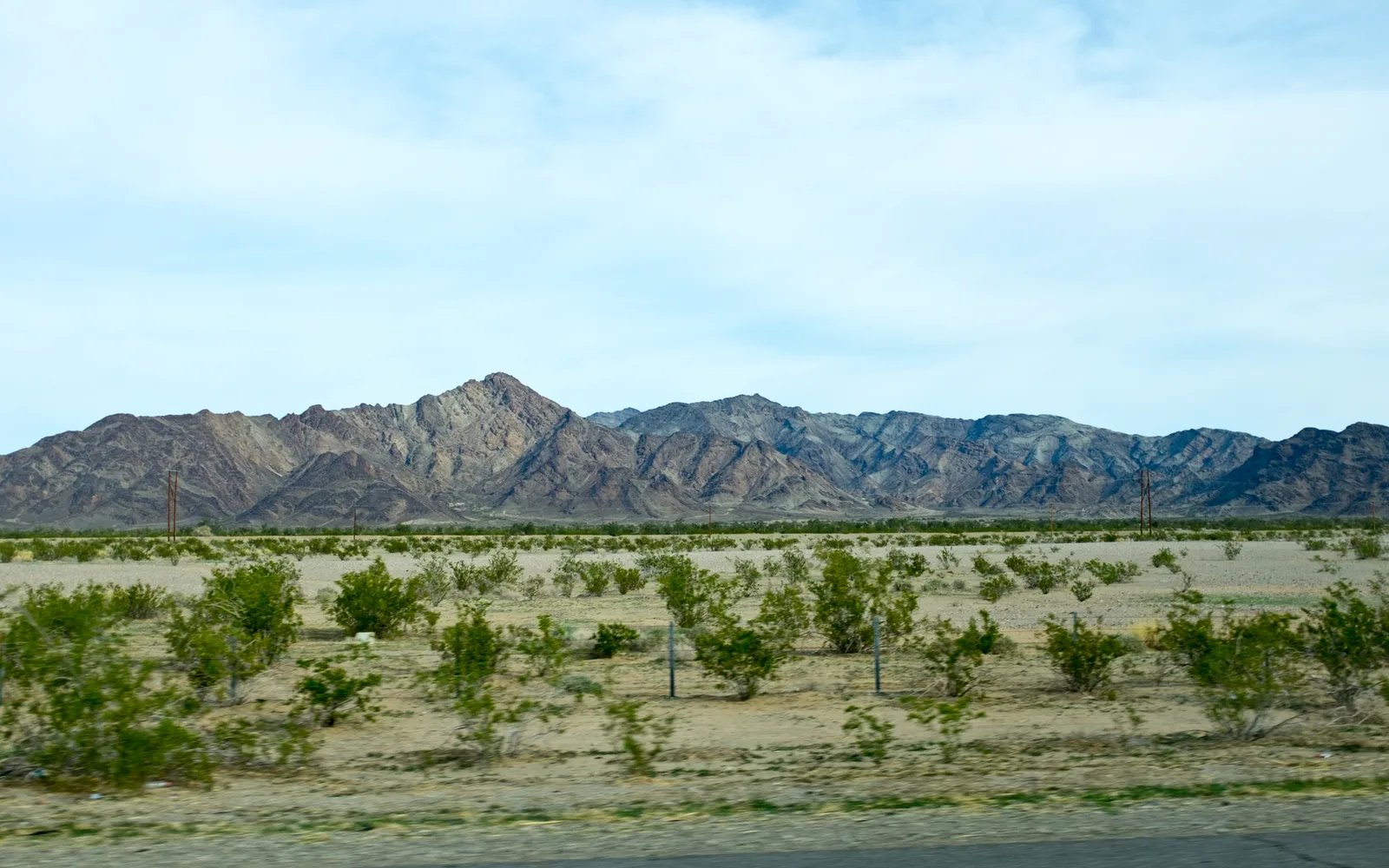 Desert landscape of the Inland Empire region as seen from Interstate 10, showing the vast open terrain characteristic of Southern California